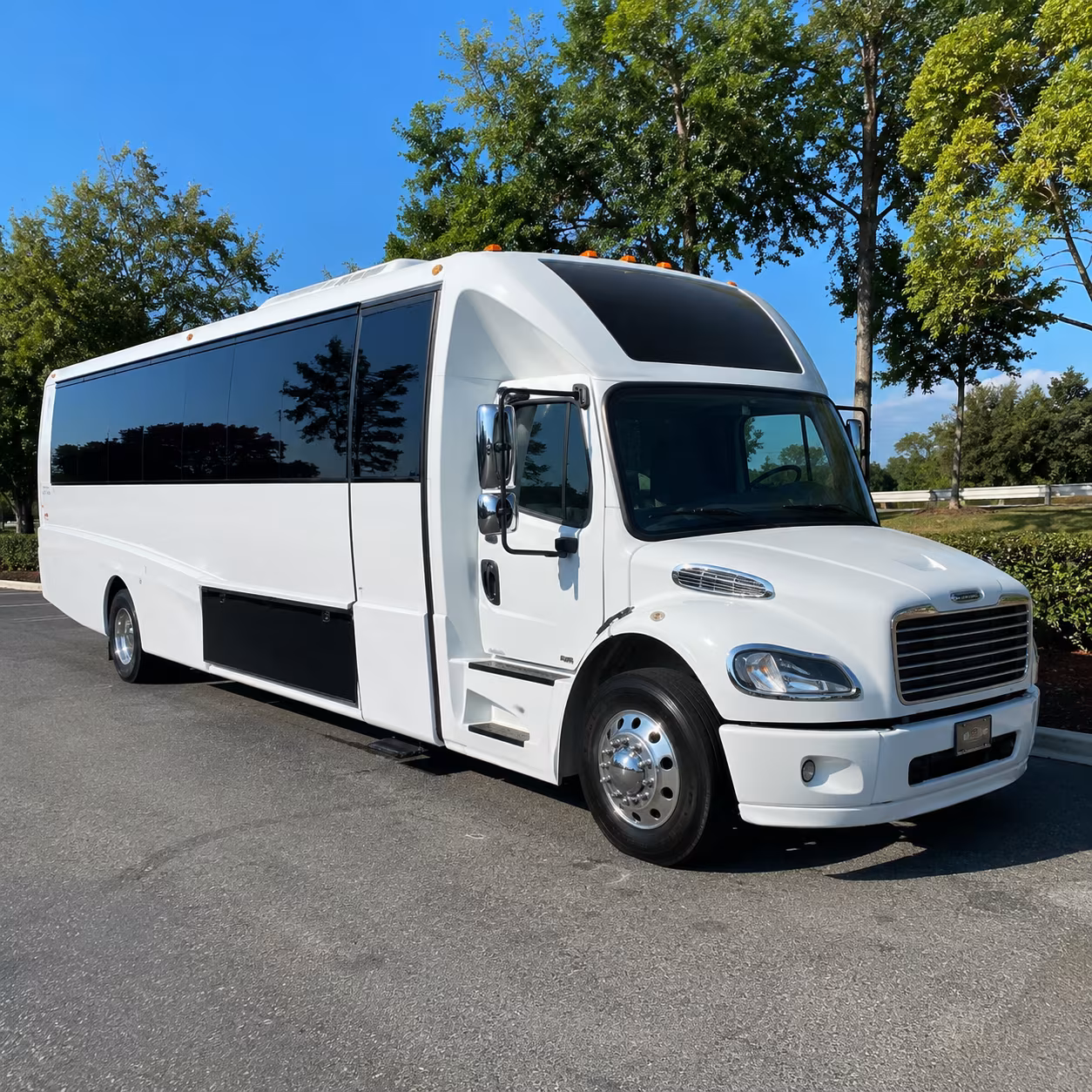 Passenger watching the McKinney scenery during a regional party bus road trip